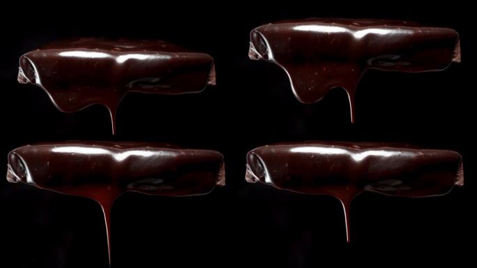 随着一滴黑巧克力从巧克力棒上滴下来而向下移动，特写。