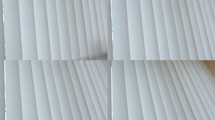 垂直百叶窗，由厚织物制成的窗帘，可以阻挡来自窗户的光线。