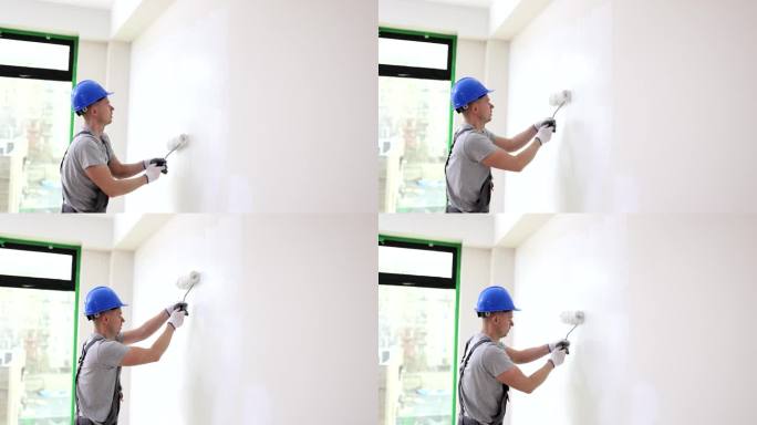 油漆工用油漆滚筒刷墙