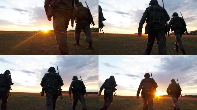 日落时分，三名全副武装的士兵在野外行走的剪影