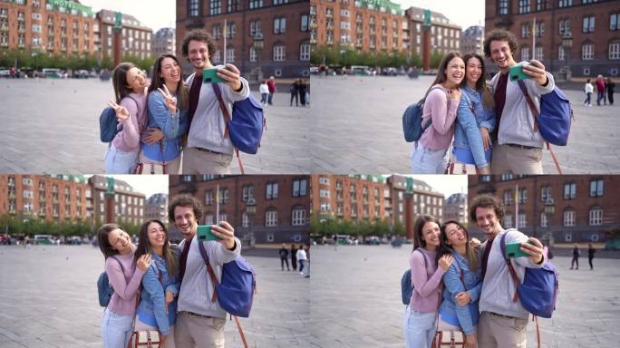 哥本哈根，三位面带微笑的游客在自拍