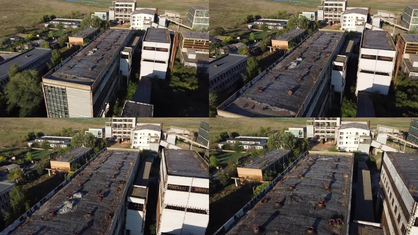 正在接近的无人机拍摄的位于罗马尼亚Vadu的一家稀有金属企业的破旧建筑，该企业曾经生产核能材料。