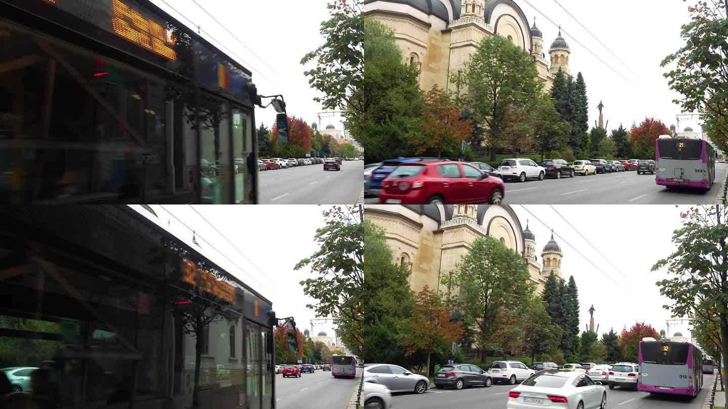 克鲁日，罗马尼亚——2023年10月9日:紫色无轨电车在城市街道上行驶。