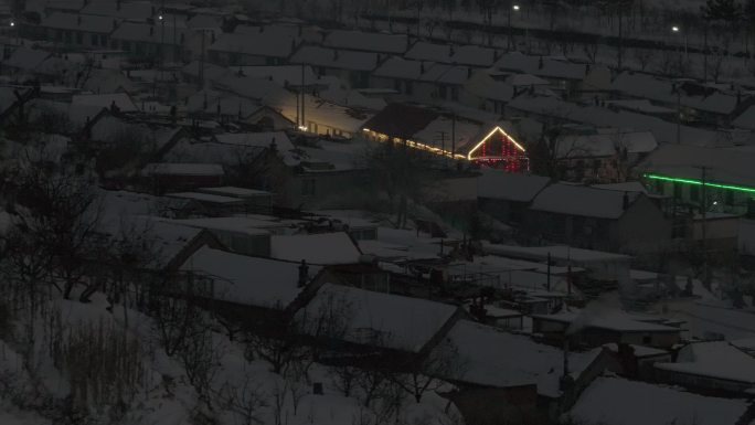 航拍威海里口山刘家疃村冬季雪后村庄房屋
