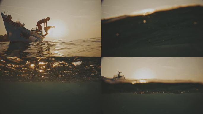 黄昏潜水:一对夫妇在日落时分从船上跳入大海，玩得很开心