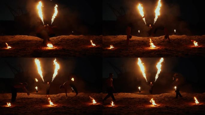 两个杂技演员在空中跳跃和空翻，神秘的火焰表演，慢动作