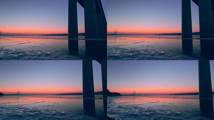 黄河结冰日落夕阳蓝调时刻河边海边大桥