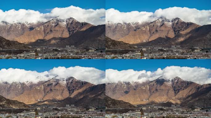 西藏拉萨蓝天白云雪山下的城市延时摄影