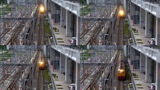 泰国曼谷邦苏中央车站，一列跨省列车在接近火车站时减速，然后完全停了下来。