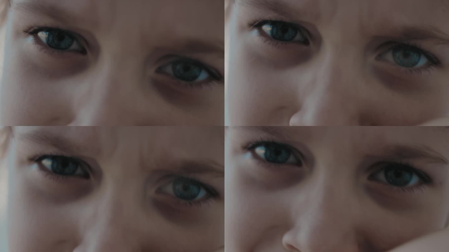 小女孩的特写镜头，蓝眼睛，时髦，疯狂，沮丧的表情。