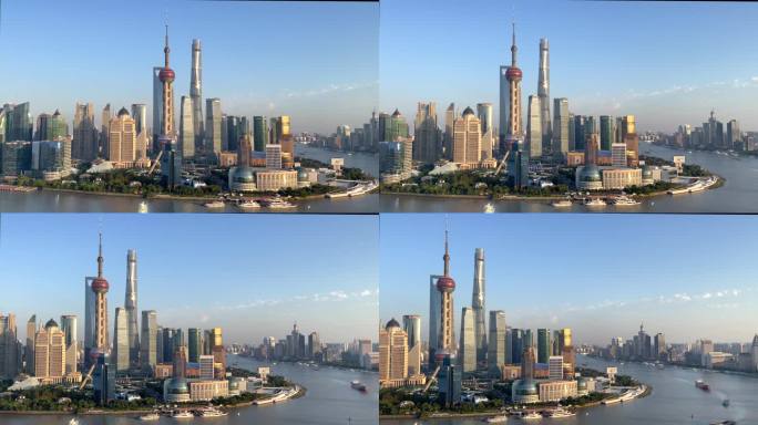 从左到右穿过令人惊叹的现代上海城市景观和天际线，经过陆家嘴，东方明珠塔和上海塔，货船穿过黄浦江