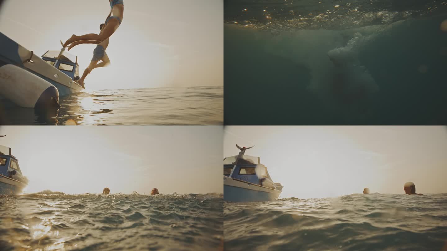 黄昏潜水:一对夫妇在日落时分从船上跳入大海