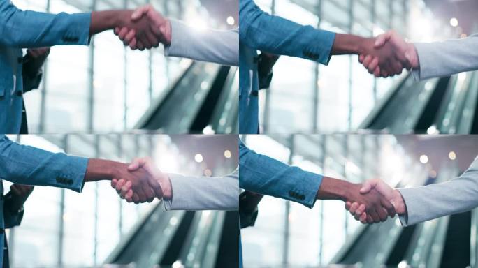 握手，欢迎与员工合作，交易或b2b伙伴关系对散景镜头耀斑。握手，约定与商务人士合作，支持或感谢你成功
