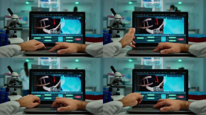 坐在笔记本电脑上分析疫苗进化的生物化学家镜头