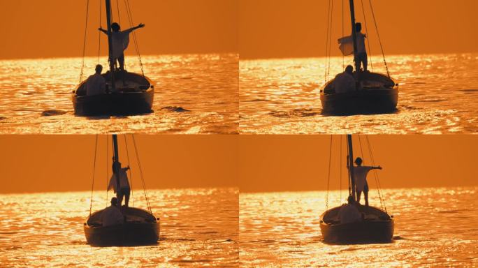 SLO MO海岸奥德赛:一对夫妇在日落时分在船上滑行的浪漫之旅