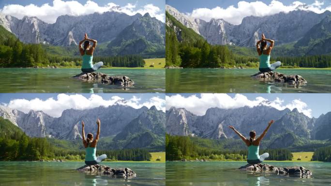 一名女子在田园诗般的山间湖上的岩石上练习瑜伽