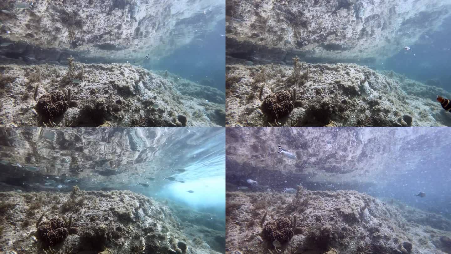 令人惊叹的水下延时，一个活泼的岩石池与顶部反射