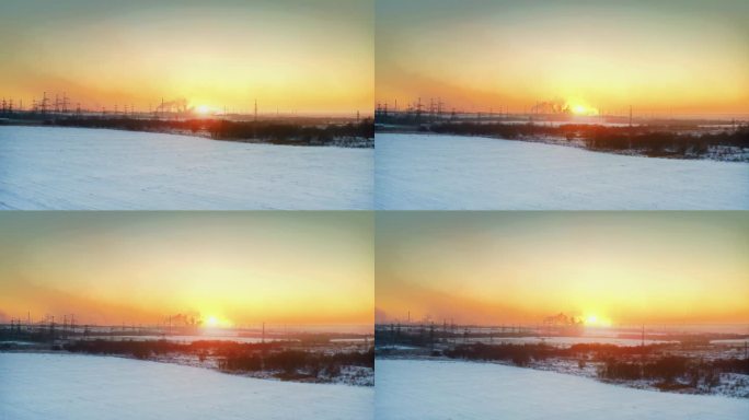 北极的能量。冬季工业地形上的日落，电力，污染。无人机拍摄。