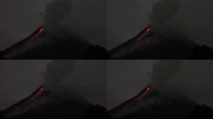 晚上默拉皮火山喷发时，从山火雪崩中滚滚而出的热云