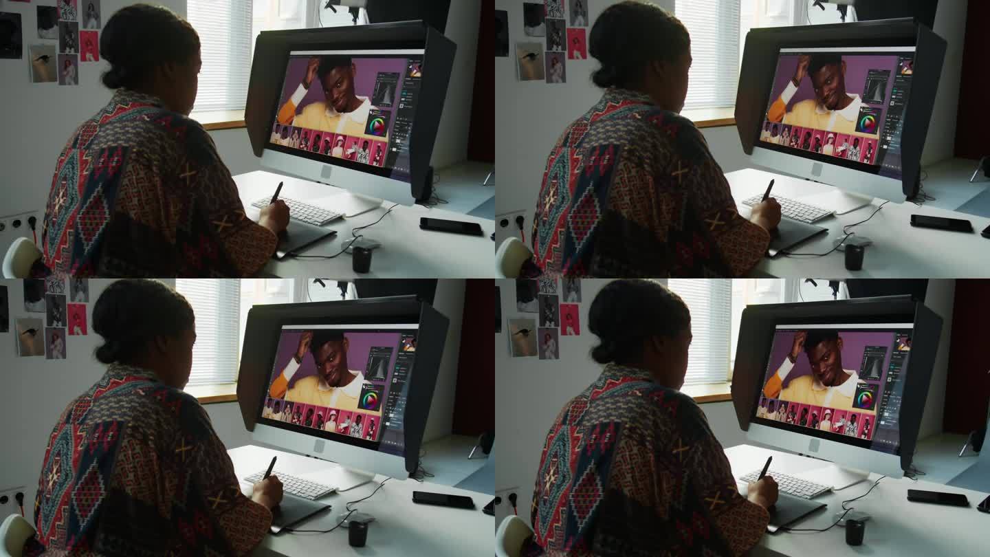 女摄影师在工作室用电脑编辑图像