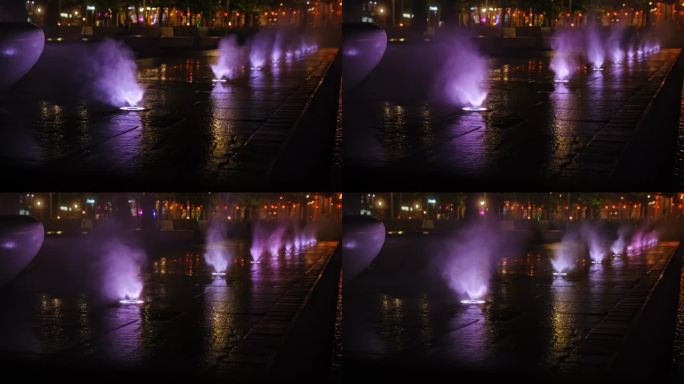 彩色城市广场雾霭喷泉与水喷头由LED灯照明