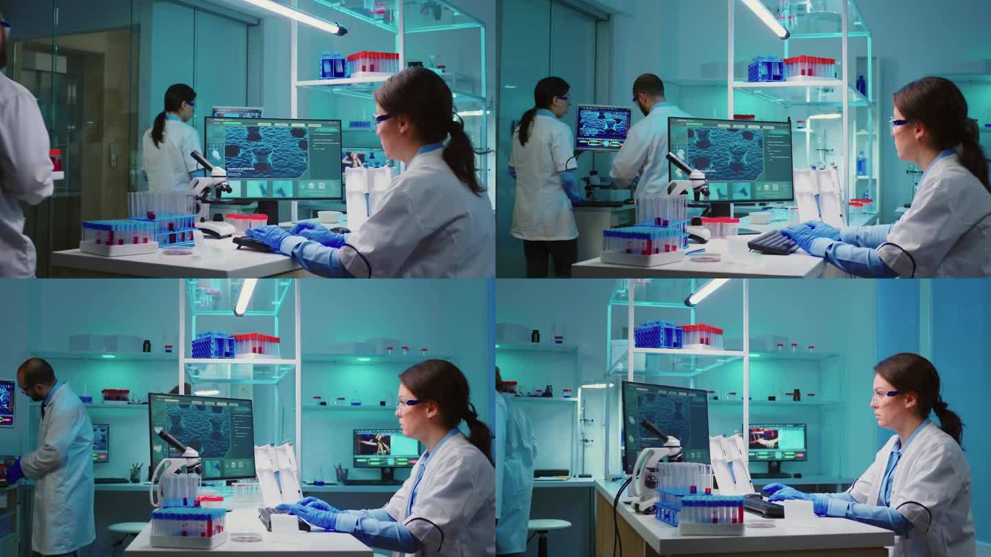 药剂师护士坐在科学实验室检查病毒进化