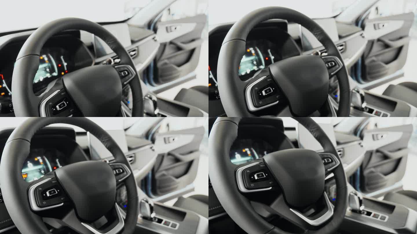 方向盘:汽车的方向盘驾驶员视角，高科技轿车仪表盘和控制