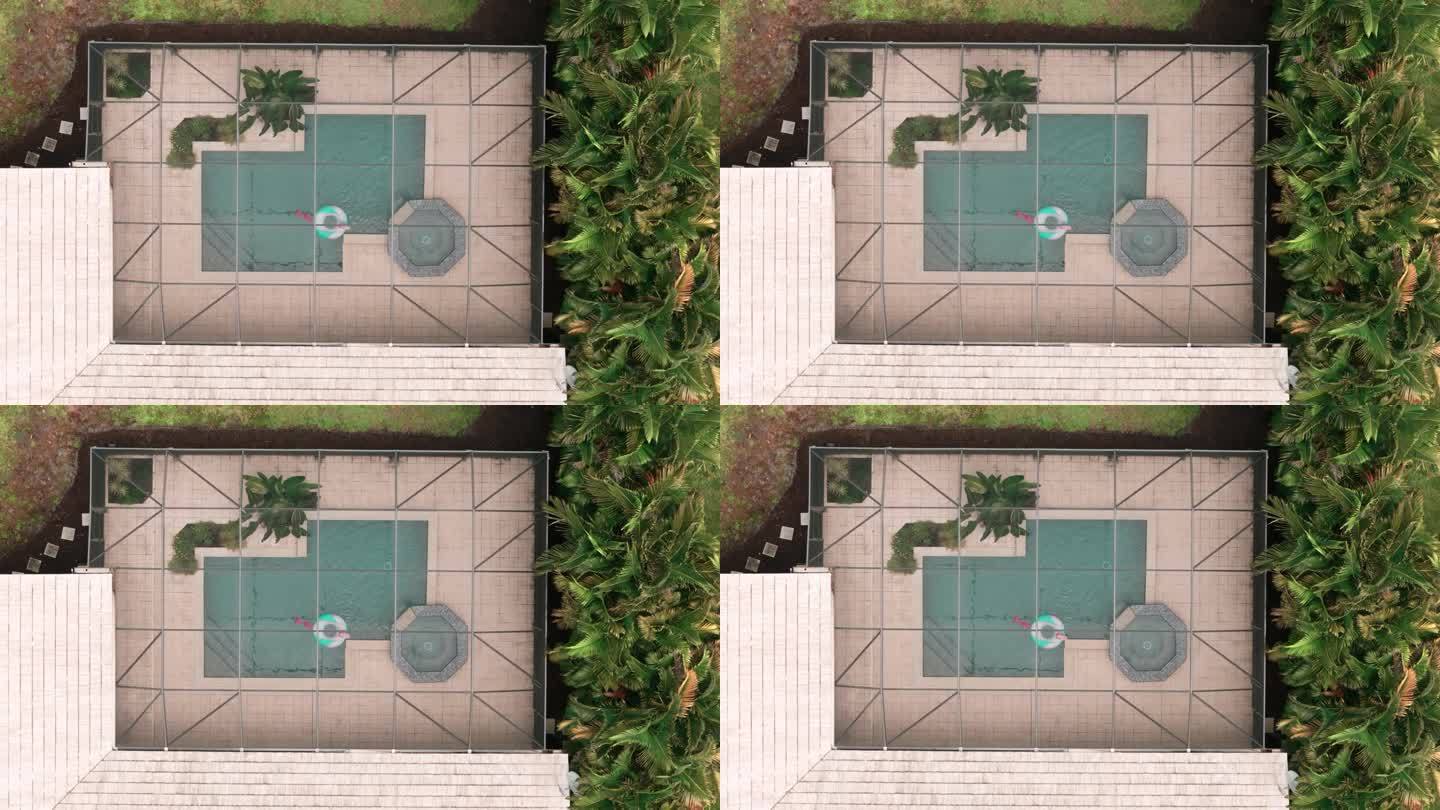 宽阔的鸟瞰图，在佛罗里达州的房子里的游泳池和拉奈岛。自顶向下射击