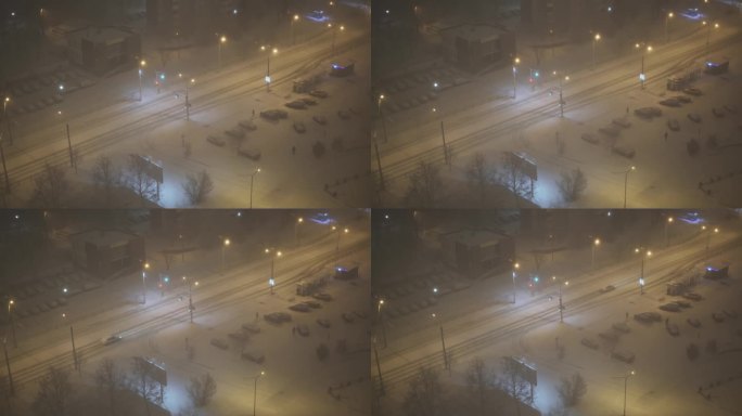 夜景，暴风雪中无人的城市街道。