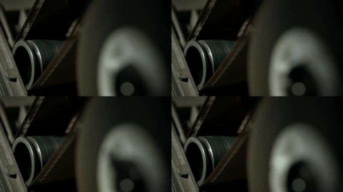 35mm曝光胶片缠绕在35mm专业胶片摄影机上的特写