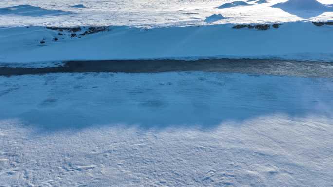 航拍海拉尔河湿地冬天冰河雪景