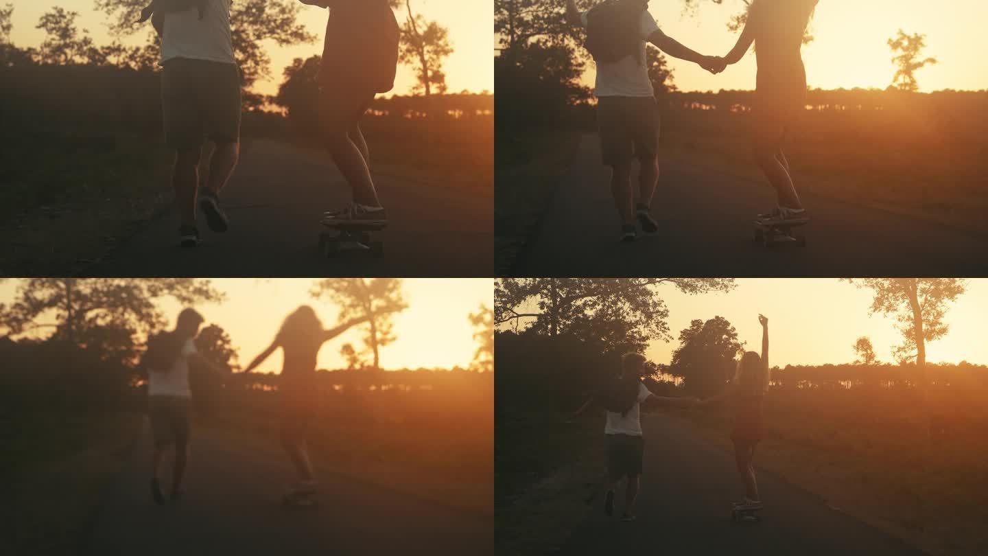 男子在乡村道路上帮助女友学习滑板