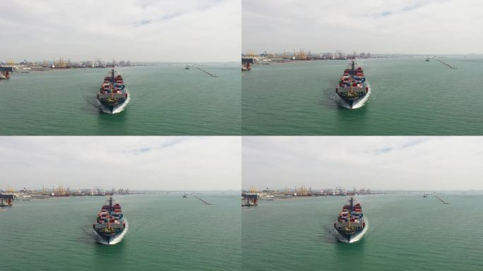 集装箱货船运载集装箱从码头商业港口
