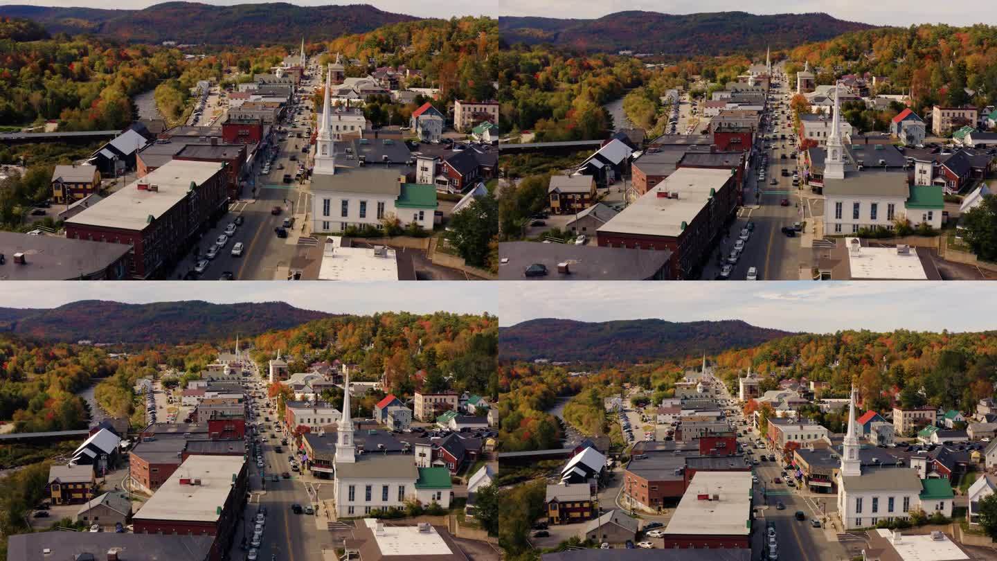 无人机平移视差拍摄风景如画的城市中心在秋天的新英格兰。