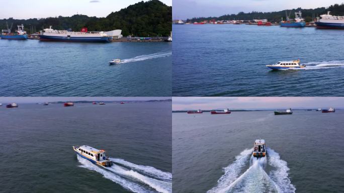 在印度尼西亚加里曼丹的巴厘巴班港附近行驶的快艇-无人机拍摄