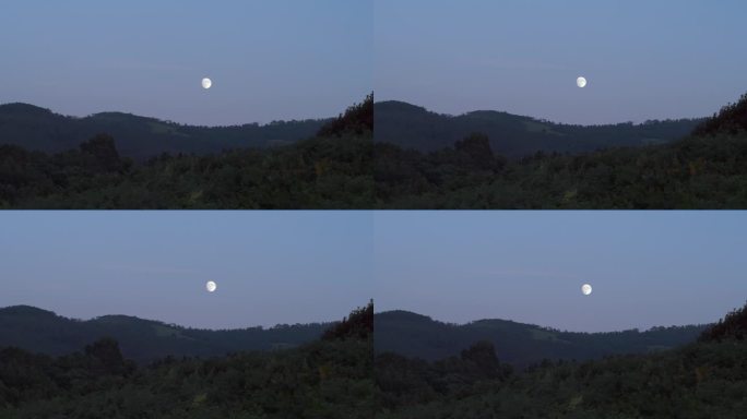 在西班牙阿斯图里亚斯的山上看月亮。黄昏时的月出