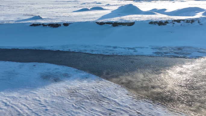 呼伦贝尔自然风光冬季不冻河雾气雪景