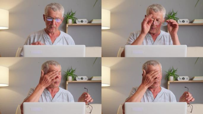网上冲浪。远程退休。疲惫的老人在家里使用笔记本电脑，感觉眼睛受伤，摩擦，长时间看电脑显示器感到不适。