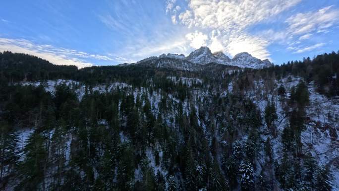 FPV无人机航拍雪山森林日出山脉蓝天白云