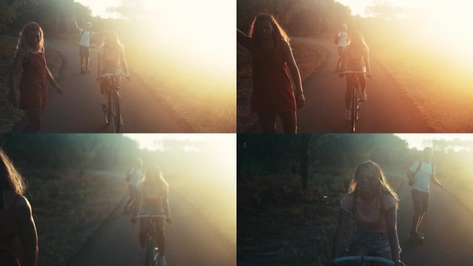 三个朋友骑着自行车和滑板在乡间小路上的剪影