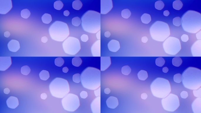 彩色气泡和球漂浮在模糊的蓝色和紫色背景