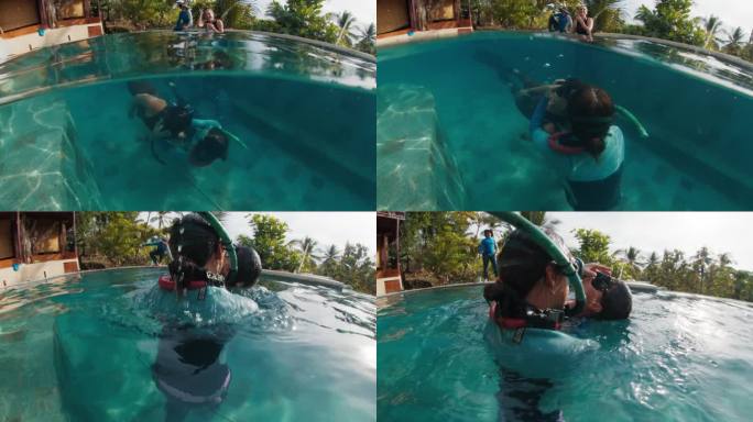自由潜水员在泳池里训练和练习泳池救援。一群自由潜水者在游泳池里锻炼
