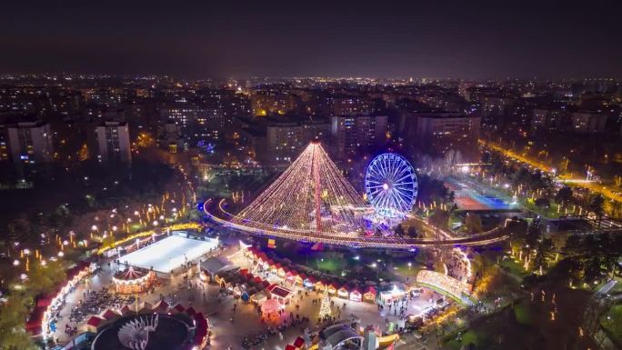 无人机在布加勒斯特圣诞市场上的夜景，罗马尼亚，Drumul Taberei