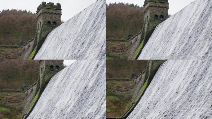 著名的豪登和德文特石坝的景观，用于电影《水坝克星》的拍摄。河水溢出大坝的墙壁，建筑两侧都有维多利亚式
