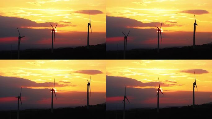 纳瓦拉(西班牙)橙色风力发电场的日出。焚风效应。