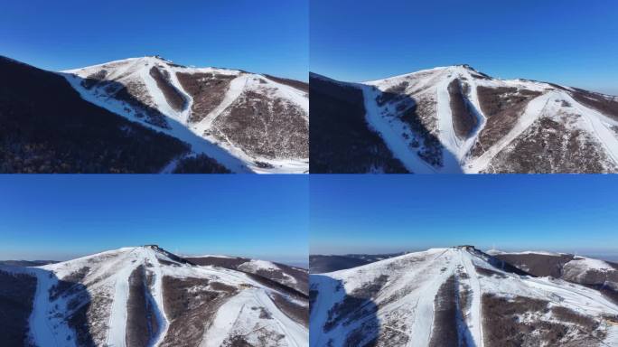 航拍北方山群雪山滑雪场