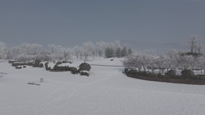 航拍威海双岛湾渔耕文化公园冬季雪凇景观