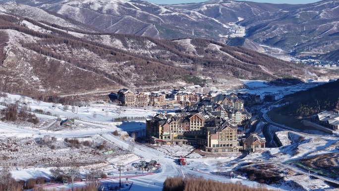 航拍北方山群雪山滑雪场