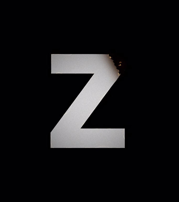 火字母显示和消失动画。Z符号燃烧像纸烬和烟在黑色的背景。设计元素