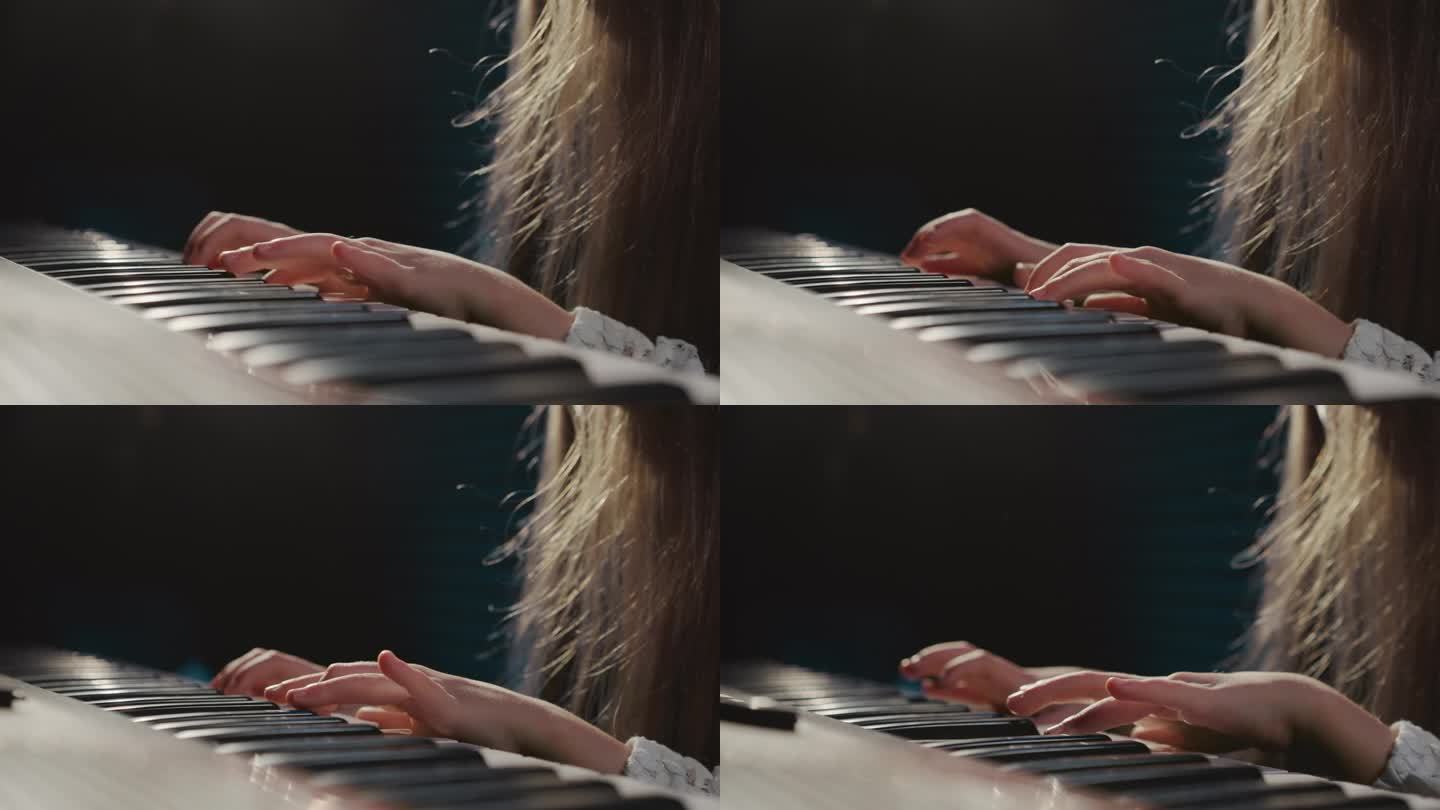 女孩熟练地弹奏钢琴键盘